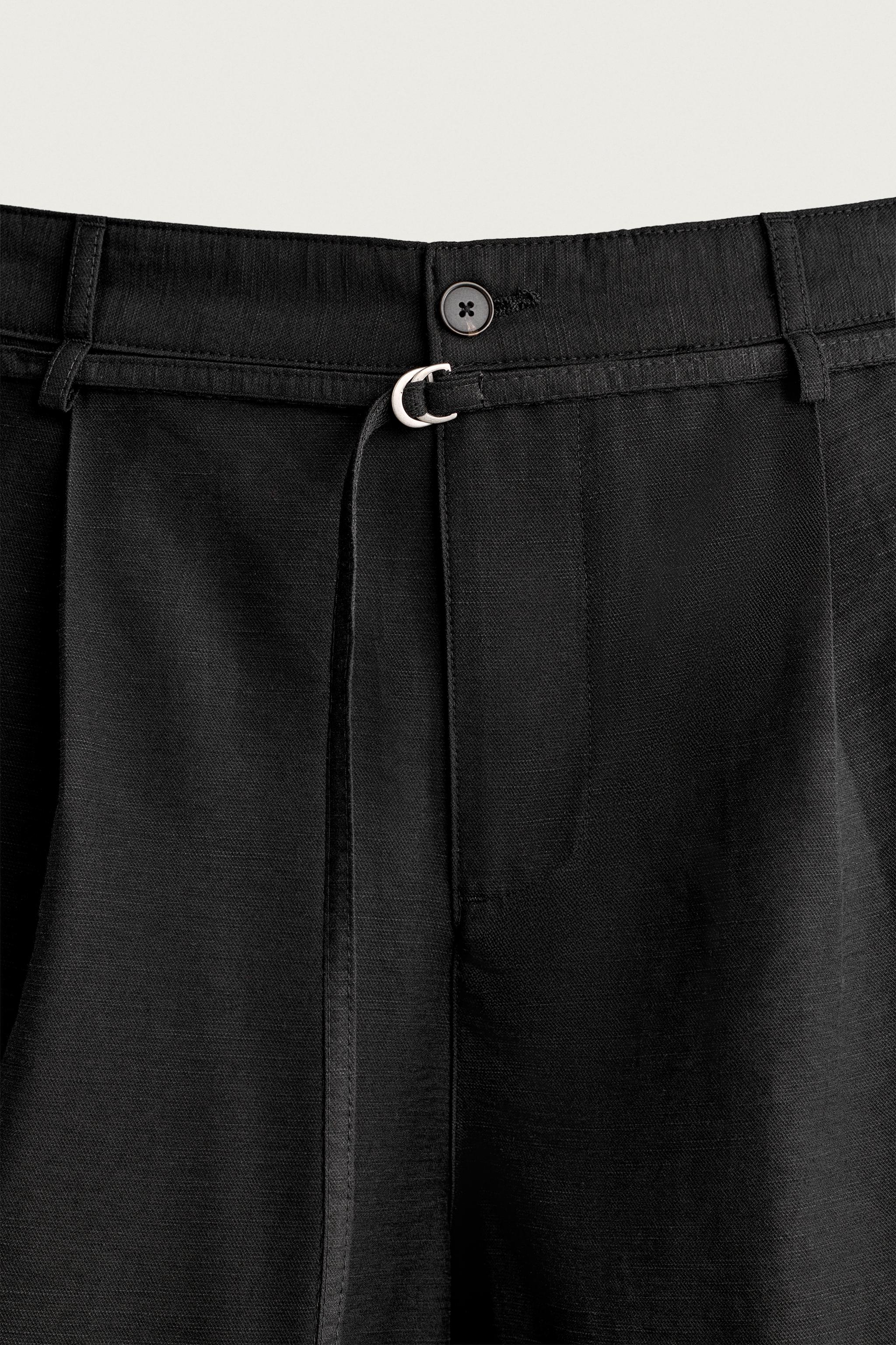 RELAXED FIT BELTED PLEATED SHORTS